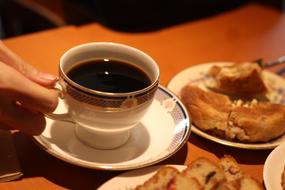 Aromatic coffee with pastries
