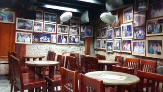 pictures on the wall in the cafe