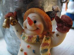 Snowman, funny figurine with christmas bells