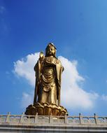Guanyin Putuo statue against Blue sky