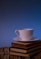 cup on the books