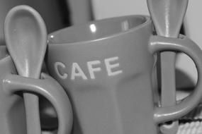Ceramic mug and spoons