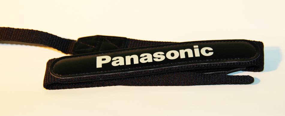 black folded panasonic Camera belt