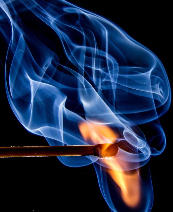 burning match, blue smoke