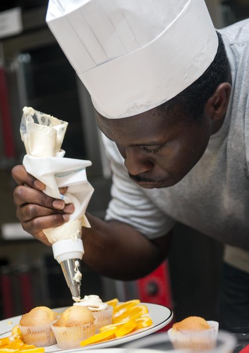 Chef Decorating Cupcakes