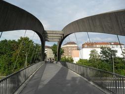 People walking on the bridge in the city