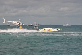 Rescue helicopter flying over the boat