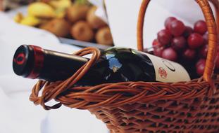 bottle of wine in basket