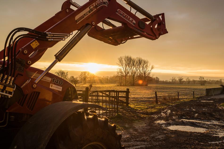 Tractor at Sun Light skyline