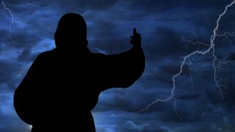 flash statue threatening sky