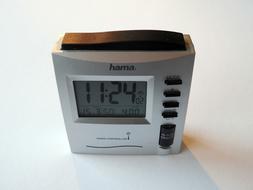 electronic alarm clock on the table