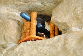 glass bottle in rocks