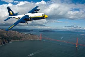 Aircraft flying over the bridge