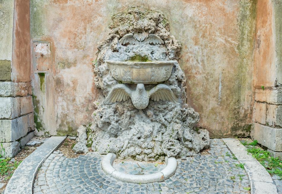 stone fountain with sculpture