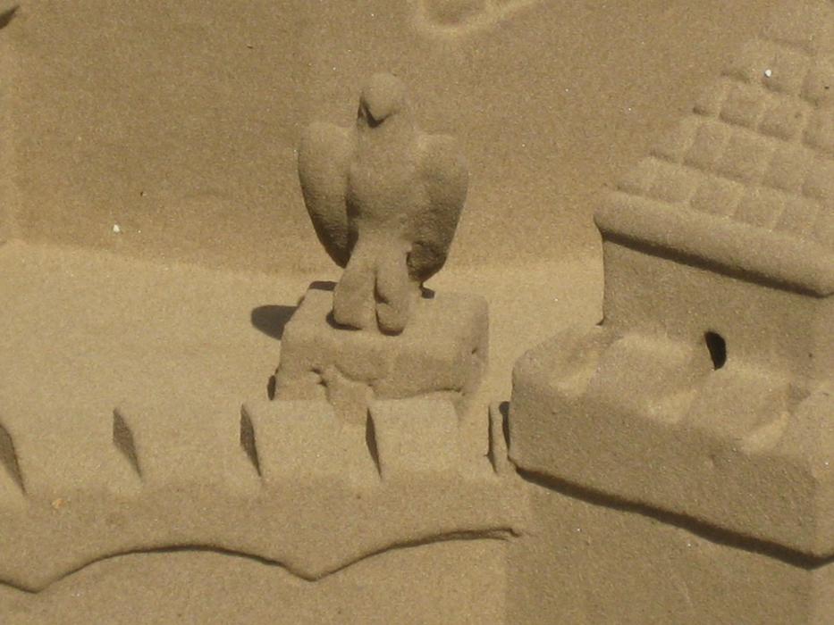 sandy eagle sculpture on the building