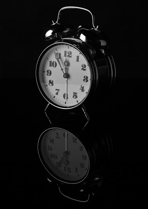 black alarm clock on transparent background