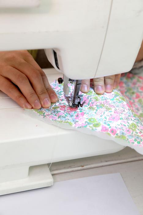 hands, sewing machine