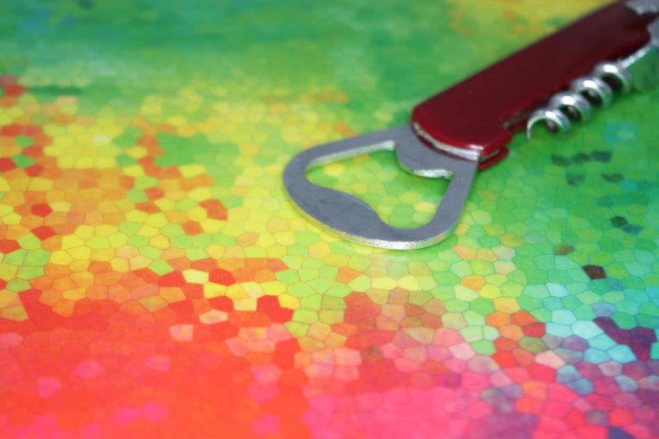 Bottle Opener at Red Green background
