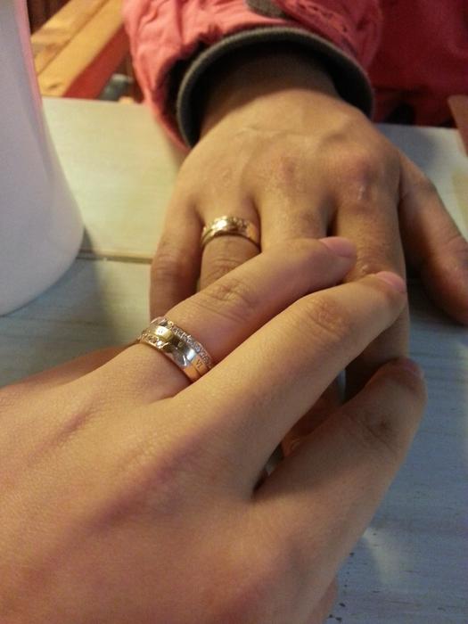 Hands of people in love in wedding rings