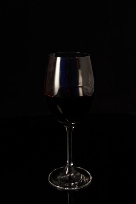 Red Wine in Glass at darkness