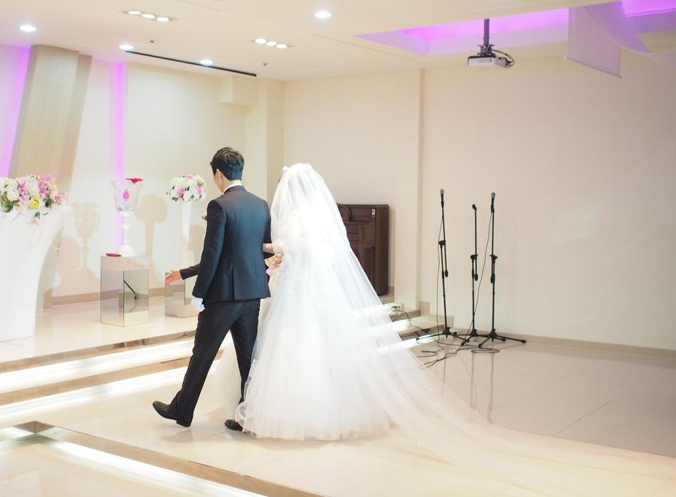 Cute couple walking down the aisle