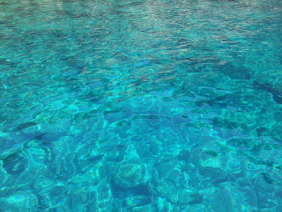 Blue clear water in the pool