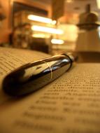 Close up of pen on book