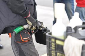 man with a gasoline tap