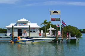 boat standing by the house at sea