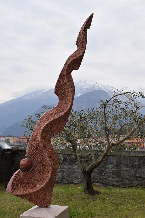 stone sculpture on the shore of lake como, Italy