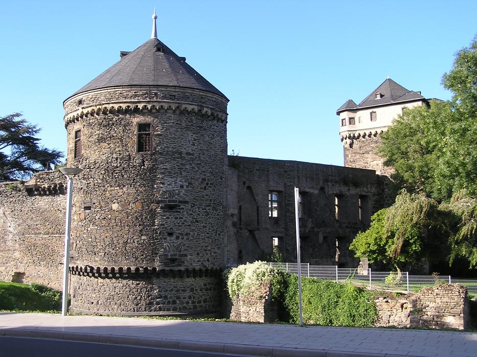 old castle tower near the fence
