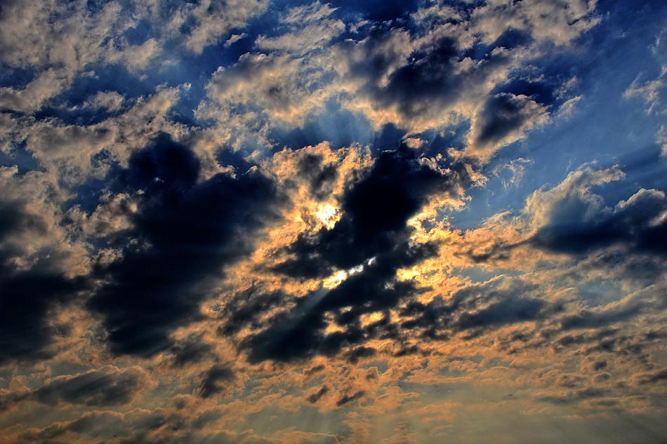 Clouds covering the bright sun