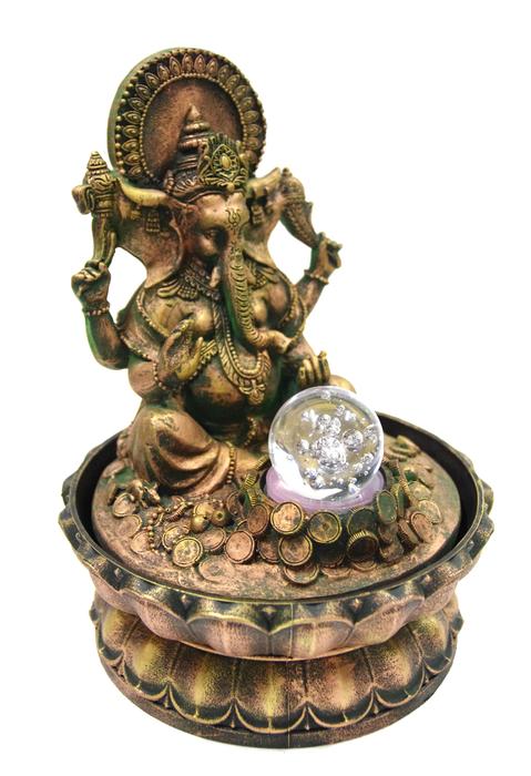 Ganesha statuette with coins