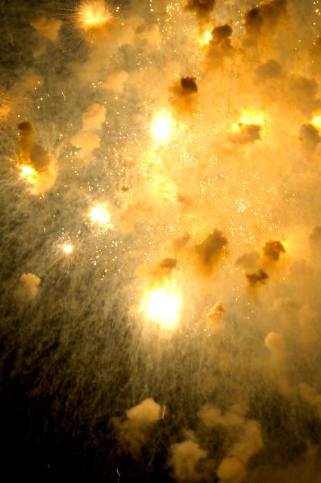 Bright fireworks in gold colors