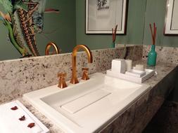 sink near the bathroom mirror