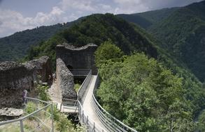 white bridge going up to the castle