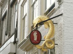 gilded restaurant sign