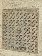 iron manhole cover with patterns