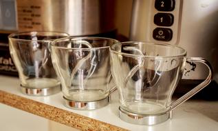 three empty demitasse cups, Espresso Glasses