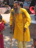 Indian man in a yellow outfit