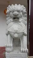 white statue near the building