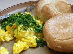 Fried egg with herbs and bread