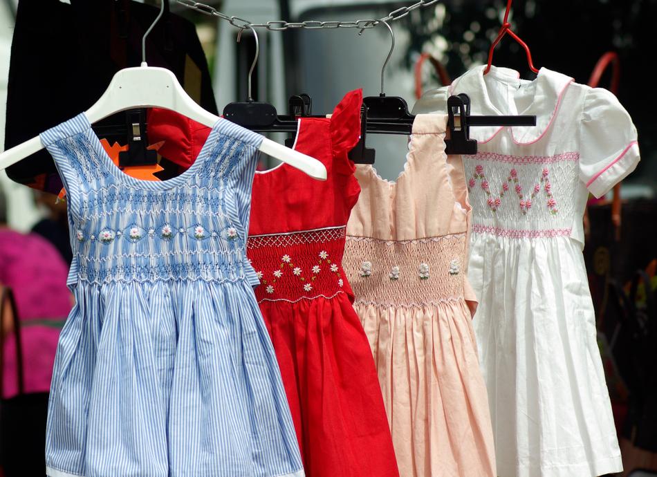 Children beautiful dresses on a hanger