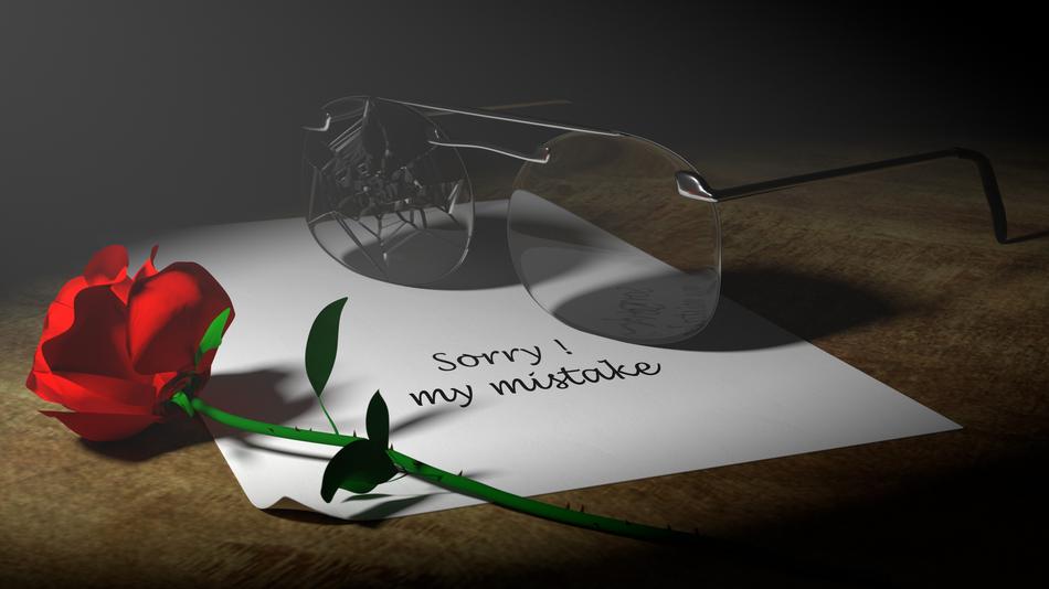 Glasses with a rose on paper