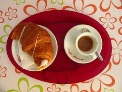 sweet croissant with coffee