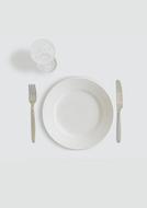 cutlery with a plate on a white table