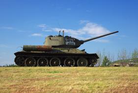 army tank in a dry field