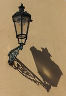 black street lamp on the wall