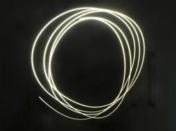 circular patterns of light in the dark