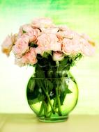 large glass vase with pink roses
